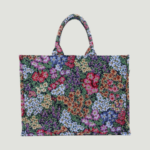 GJEN DESIGN floral tapestry tote bag with multi-colored botanical woven fabric and sturdy top handles.