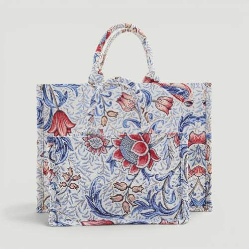 GJEN DESIGN woven floral tote bag in blue and red tapestry fabric with sturdy top handles and structured silhouette.