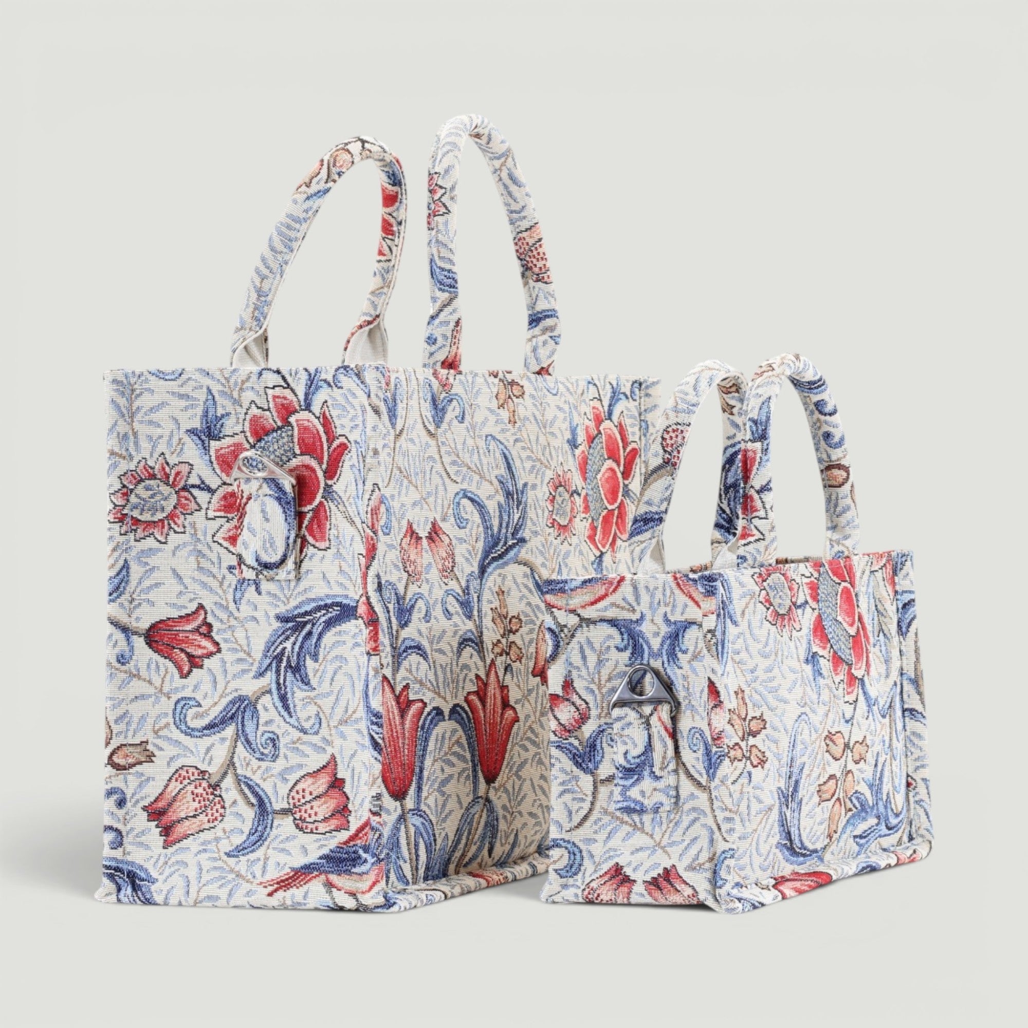 GJEN DESIGN woven floral tote bags in two sizes with red and blue botanical patterns on a cream background.