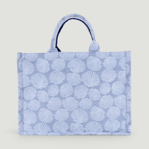 GJEN DESIGN structured tote bag in blue and white with an all-over seashell pattern and sturdy top handles.